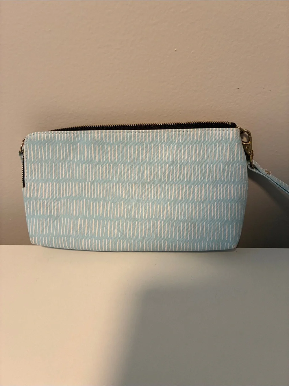 Scout Light Blue Patterned Wristlet with Gold Logo